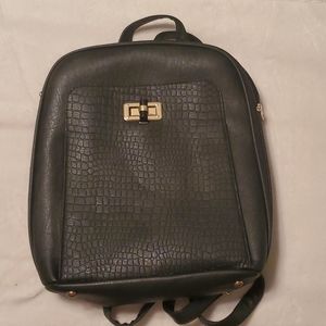 Alligator print purse back pack